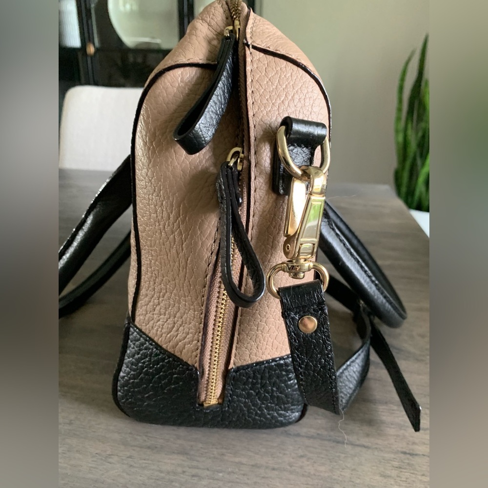 Kate Spade satchel in two tone - taupe and black. Is in pristine condition.